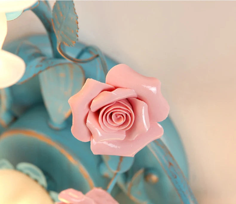 Detail of hand-painted ceramic rose on Korean Rose Ceiling Lamp, showcasing artisan floral design.
