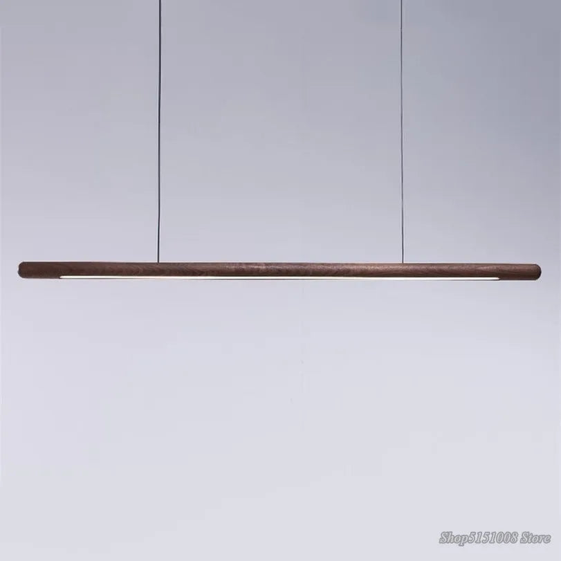 Minimalist Black Walnut Pendant Light with LED illumination, perfect for ceiling installation in modern kitchens or dining rooms.