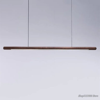 Minimalist Black Walnut Pendant Light with LED illumination, perfect for ceiling installation in modern kitchens or dining rooms.