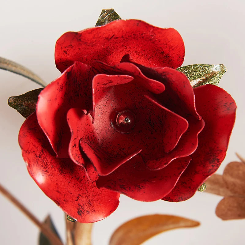 Detailed view of red rose accent on romantic LED bedroom pendant chandelier, perfect for wedding and home lighting themes.