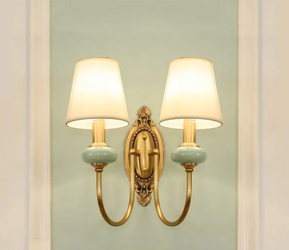 Dual-arm copper wall lamp LED sconce with fabric shades, perfect for hotel or office lighting with a vintage modern aesthetic.