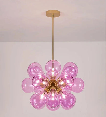 Purple Scandinavian glass chandelier with black lampbody, combining playful color with elegant Nordic design.