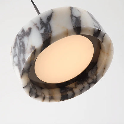 Close-up of Black Marble Dome Pendant - LED Lamp showing the illuminated underside and smooth marble texture for premium lighting appeal.