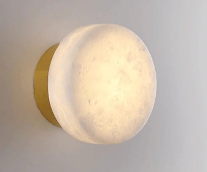 Modern LED Marble Wall Lamp with gold base, combining luxury and functionality for stylish corridor or living room lighting.