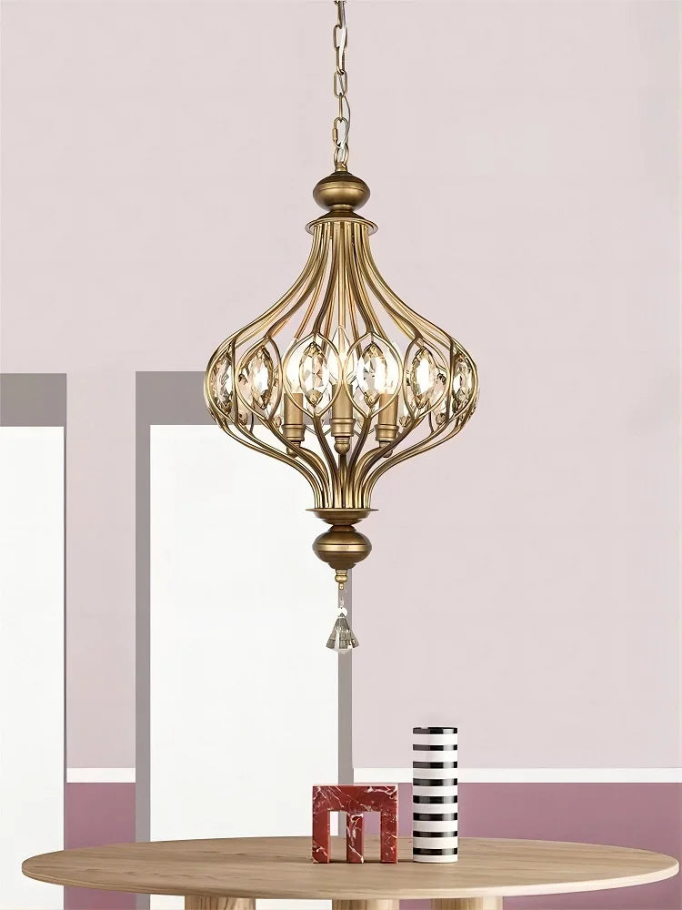 Vintage-style crystal lantern chandelier suspended above a table, enhancing classic interior design with refined lighting.