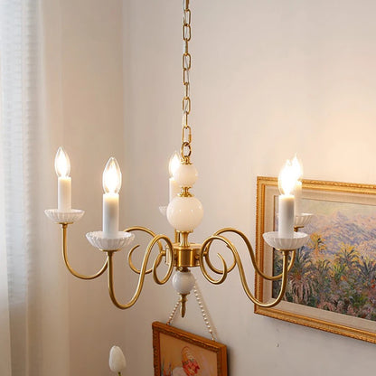 Lustre en cuivre avec bougeoirs