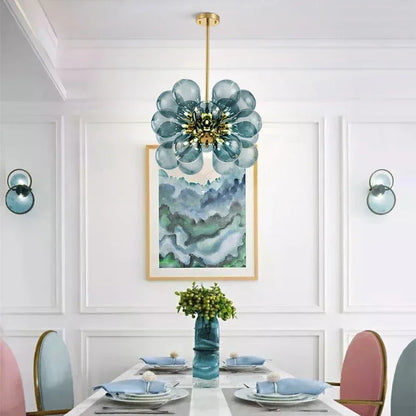 Nordic design pendant light with blue glass bubbles hanging over a dining table, enhancing elegant Scandinavian interior decor.