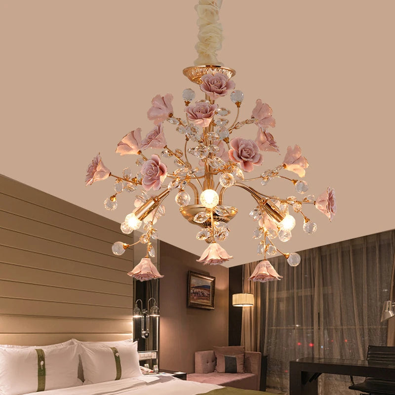 Modern LED Rose Crystal Chandelier with dimmable lighting and floral design, enhancing bedroom ambiance with energy-efficient elegance.