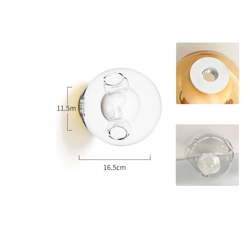 Clear glass LED wall sconce with Italian design, offering a clean and modern lighting solution for bedrooms or cafés.