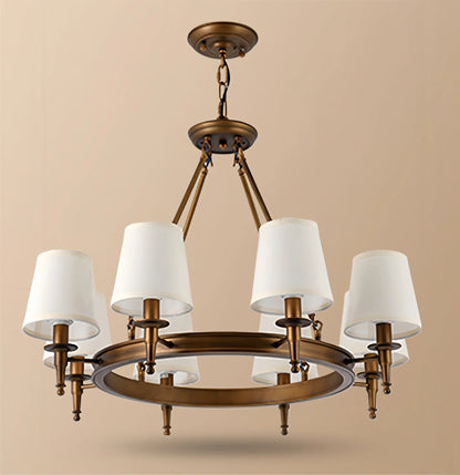 Koperen kroonluchter met stoffen lampenkappen