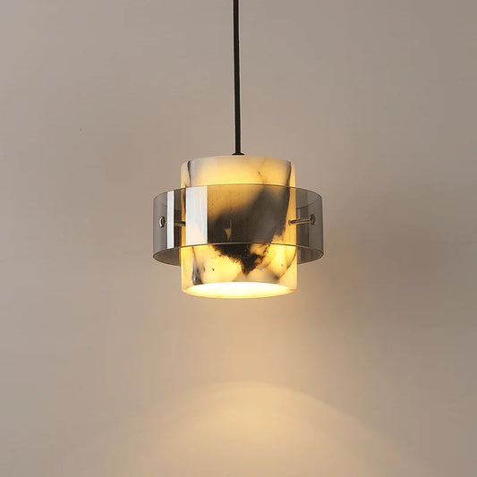 Stone Drop Pendant - LED Marble Light with soft glow and modern cylindrical design, ideal for luxury home decor and ambient lighting.