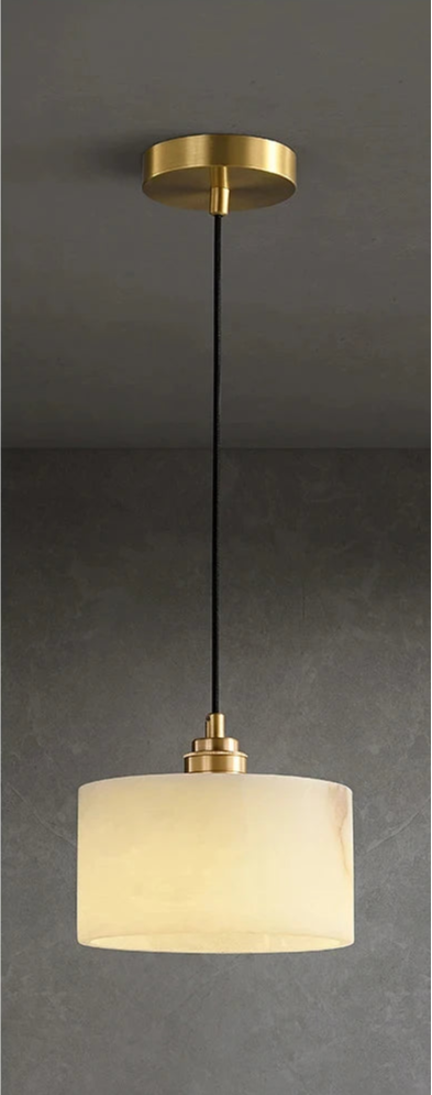 Round marble pendant light shown lit and unlit, featuring adjustable height and brass ceiling mount for modern interiors.