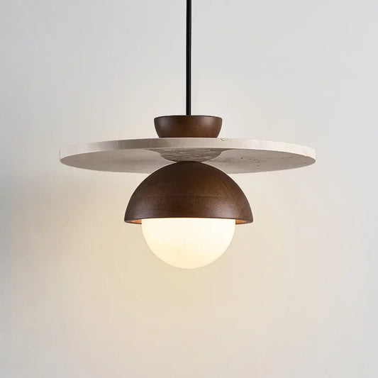 Walnut wood pendant with stone disc and LED globe bulb, minimalist light fixture for modern interiors and bedside lighting.