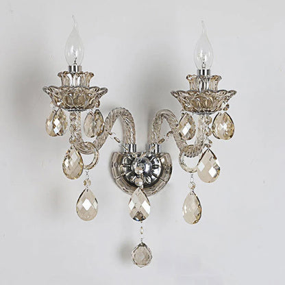 Classic vintage lotus crystal wall sconce with clear amber finish and LED bulbs, ideal for elegant bedroom or hallway lighting.