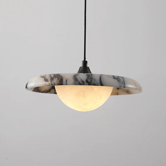 Matte Marble Pendant Lamp with black round design and soft LED glow, ideal for modern bedroom lighting and elegant interior decor.