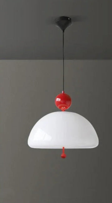 Side-by-side comparison of Medieval Pendant Light turned on and off, showcasing its vintage glass dome and red top.