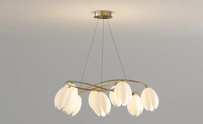 Cream Modern Ceiling Light with petal-shaped LED bulbs and gold frame, turned on to provide soft, ambient lighting.