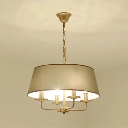 Round European retro fabric chandelier with beige drum shade and gold chain, offering soft LED lighting for elegant interiors.