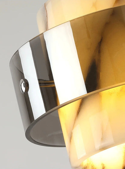 Close-up of the illuminated LED Marble Pendant Light, highlighting the warm glow through the natural stone and smoked glass.