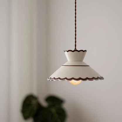Scalloped-edge ceramic pendant lamp in white with LED bulb, ideal for vintage-inspired home lighting decor.