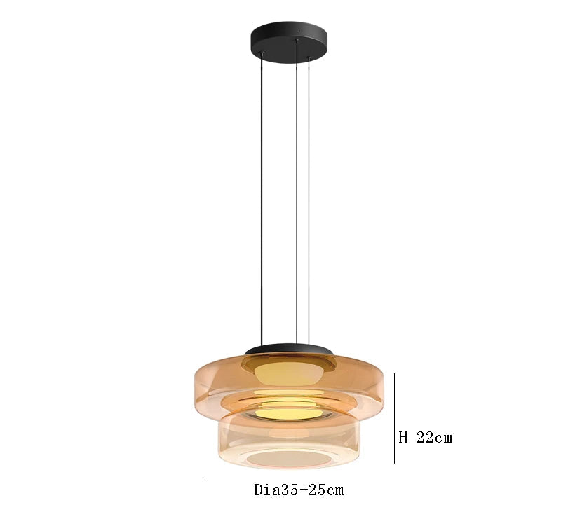 Amber two-tier glass pendant light with 35cm and 25cm diameters. LED source and adjustable wire for elegant lighting.