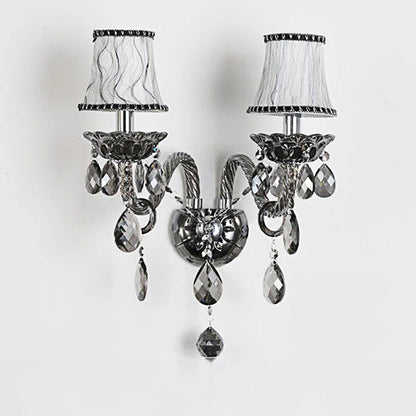 Vintage crystal wall lamp with dual black fabric shades and dark lotus sconces, perfect for French-inspired home decor.