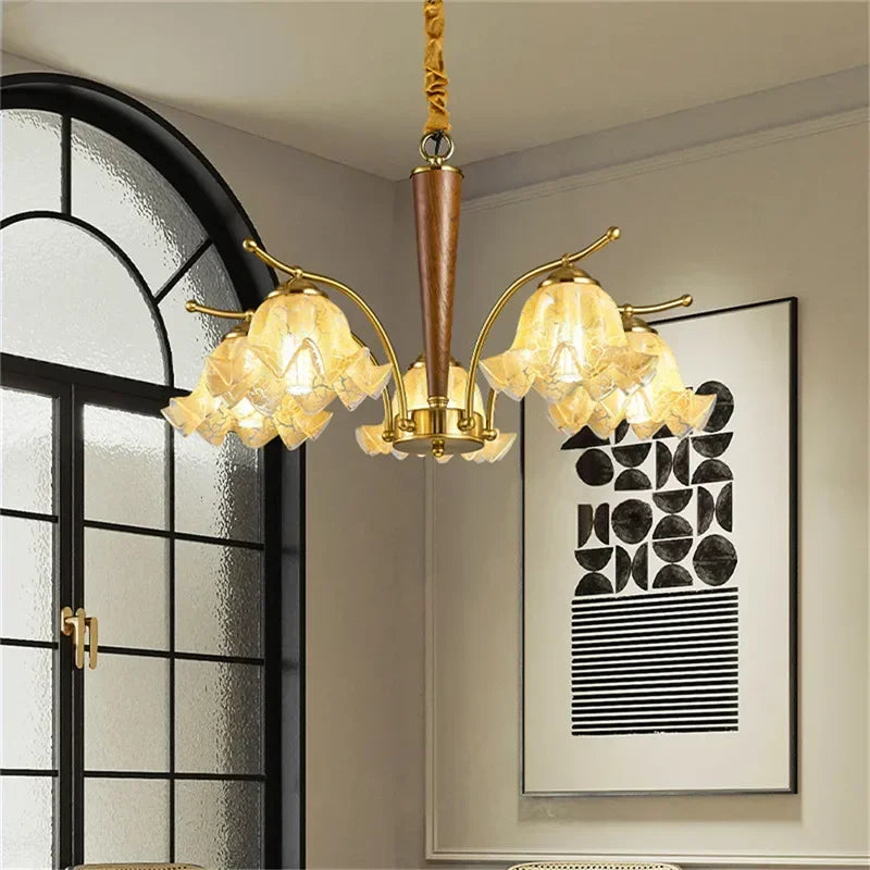 Contemporary LED Hanging Lamp with floral glass shades and brass finish, enhancing dining or lounge areas with warm ambient lighting.