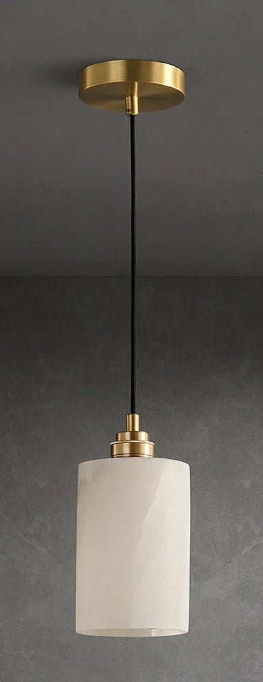 Cylindrical marble pendant light in two lighting states, ideal for luxury kitchen island or dining room lighting.