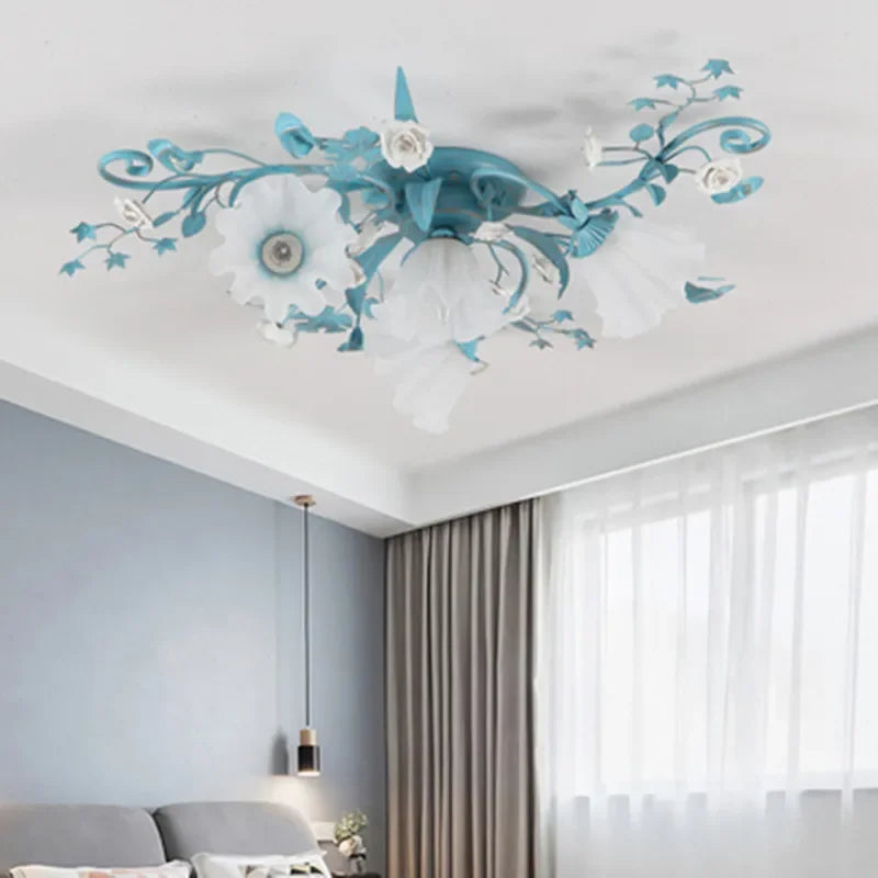 Blue and white Korean Rose Ceiling Lamp with floral glass shades, ideal for minimalist or pastel-themed bedroom interiors.