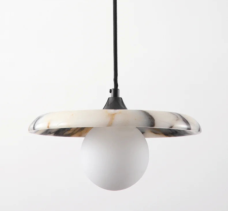 Comparison of Marble Pendant Light turned off and on, highlighting the warm LED glow and elegant black chandelier design for indoor use.