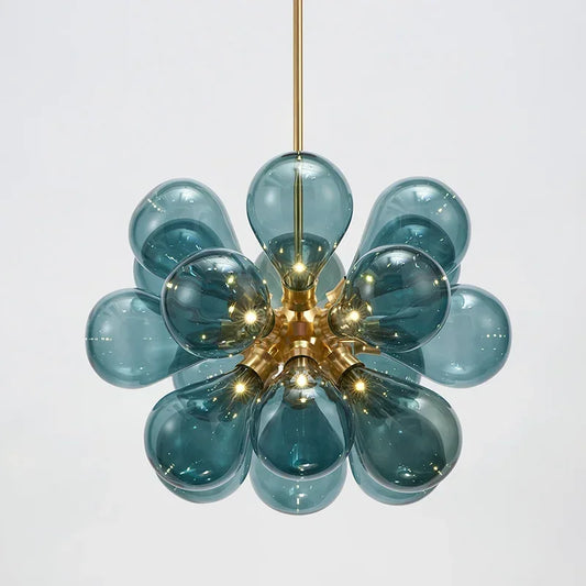 Scandinavian glass chandelier with blue bubble glass and gold finish, ideal for modern pendant lighting in dining or living spaces.