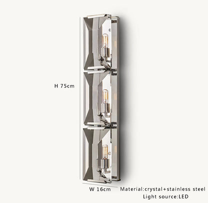 Silver crystal LED wall sconce with three LED bulbs, 75cm tall, offering reflective elegance for modern interiors.