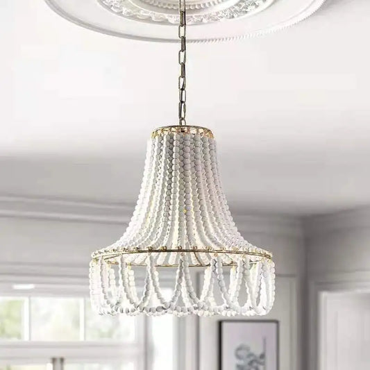 Bohemian Bead Chandelier - Rustic Pendant Light | Wood, hanging in a bright living space with white ceiling medallion and natural light.