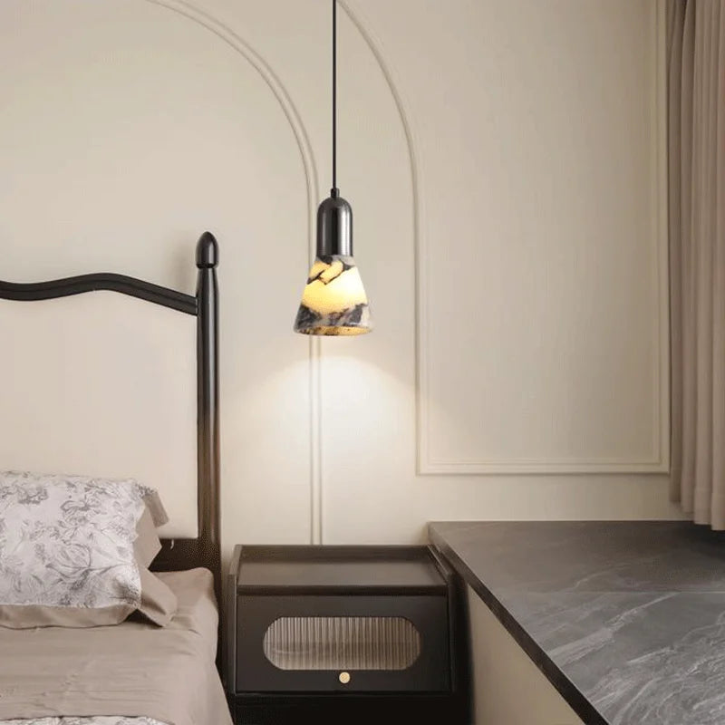 Dark Marble LED Pendant - Modern Ceiling Light mounted beside bed, blending with classic interior design and providing ambient lighting.
