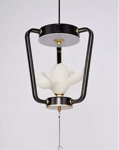 Close-up of single-light Magnolia Flower Pendant Light in black, showcasing LED floral bulb and retro-modern design.