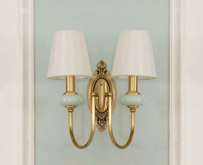 Symmetrical copper LED wall sconce with two fabric-covered lights, designed for elegant home and garden wall lighting.