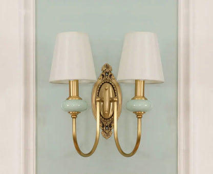 Symmetrical copper LED wall sconce with two fabric-covered lights, designed for elegant home and garden wall lighting.