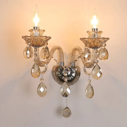 Elegant lotus-shaped vintage wall sconce with exposed LED bulbs and crystal droplets, perfect for classic bedroom or hallway decor.