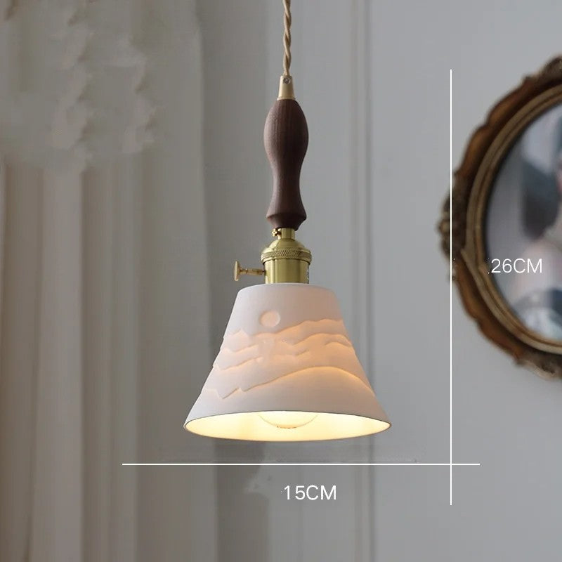 Ciondolo in rame con nappina in ceramica bianca