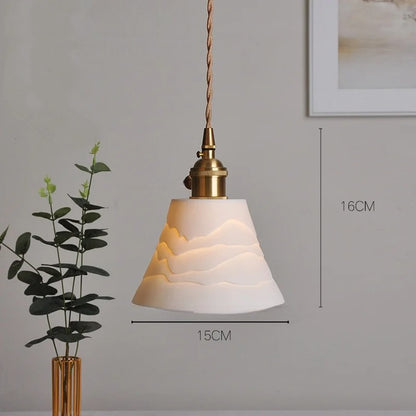 Ciondolo in rame con nappina in ceramica bianca