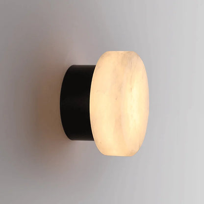 Side angle of Modern LED Marble Wall Lamp with black base and glowing marble shade, perfect for corridor or hallway use.