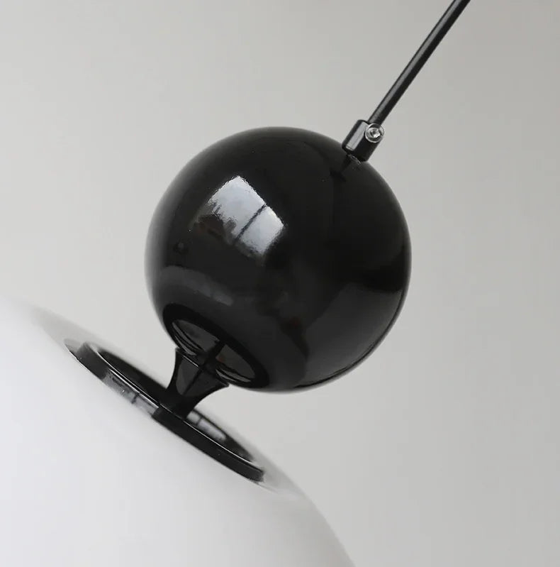 Detailed view of black spherical top on the Medieval Chandelier Pendant Light, emphasizing its retro-modern aesthetic.
