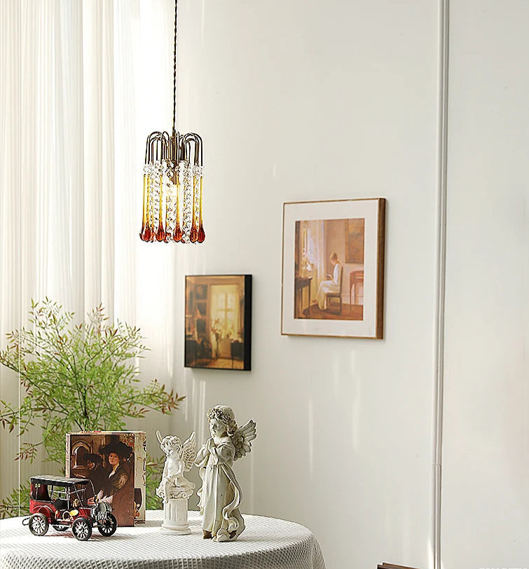 Vintage Water Drop Glass Chandelier - Copper Pendant hanging above a decorative table, ideal for home and garden lighting.