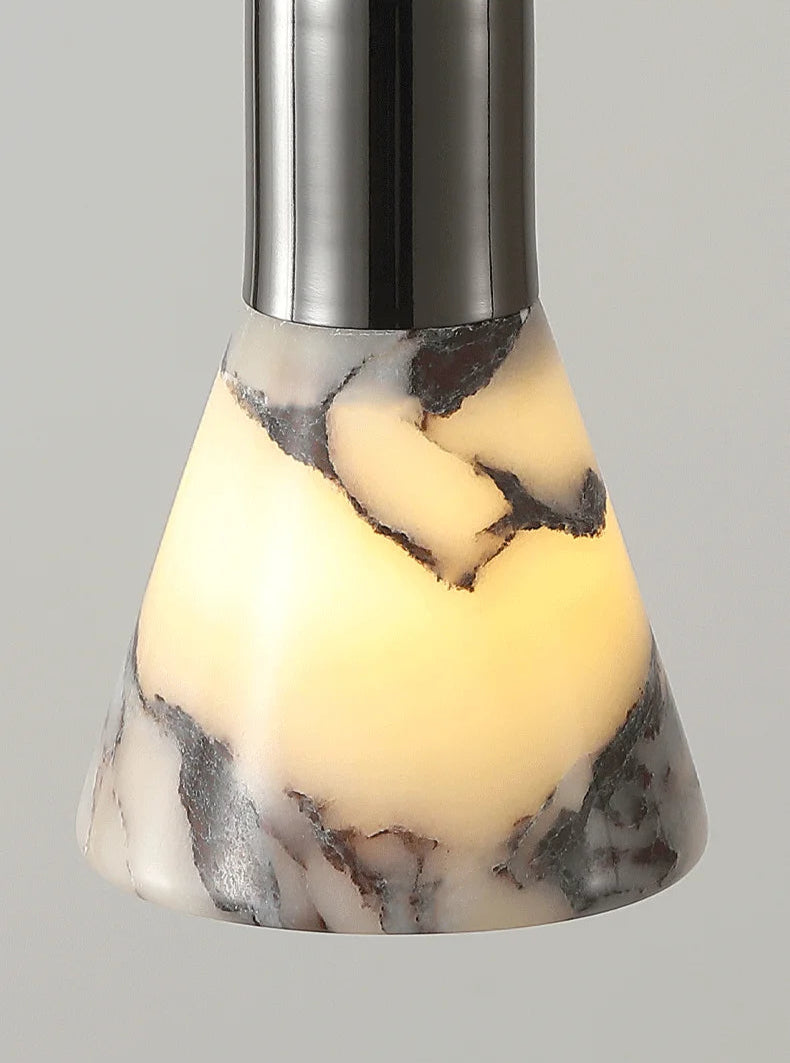 Dark Marble LED Pendant - Modern Ceiling Light glowing with warm LED illumination, emphasizing the natural marble design of the shade.