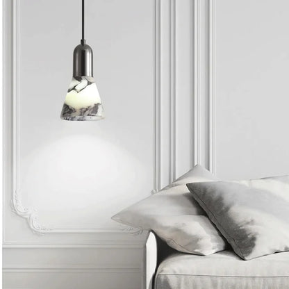 Dark Marble LED Pendant - Modern Ceiling Light hanging in a minimalist living space, showcasing its elegant marble finish and soft LED glow.