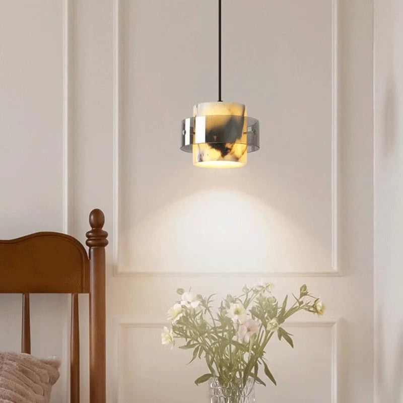 Stone Drop Pendant - LED Marble Light illuminating a cozy corner, perfect for enhancing modern home interiors with ambient lighting.