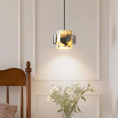 Stone Drop Pendant - LED Marble Light illuminating a cozy corner, perfect for enhancing modern home interiors with ambient lighting.