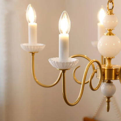 Lustre en cuivre avec bougeoirs