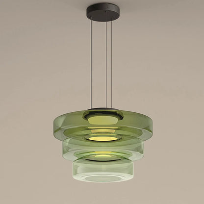 Three-tier green glass pendant light with LED, ideal for luxury kitchen or dining room decor. Features layered circular design.