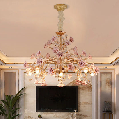 Luxury Rose Crystal Chandelier featuring LED bulbs and ornate pink roses, perfect for upscale living room or entertainment area lighting.